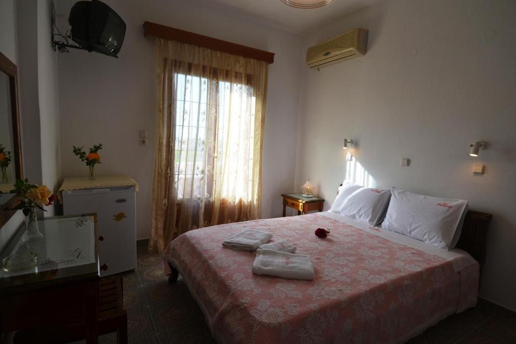 Postel nebo postele na pokoji v ubytování Villa Georgia