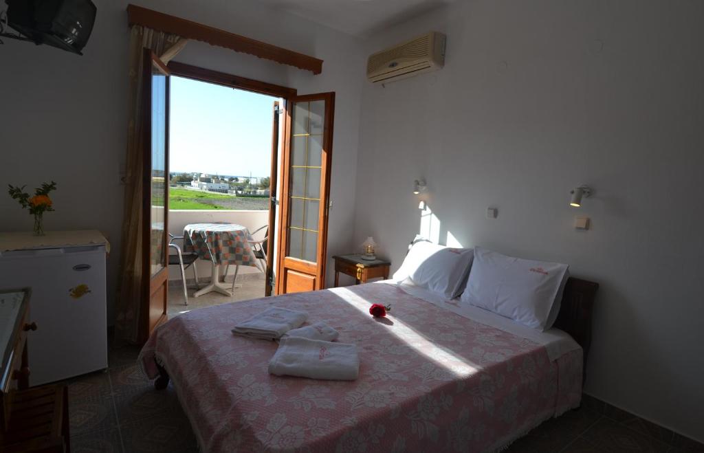 Postel nebo postele na pokoji v ubytování Villa Georgia