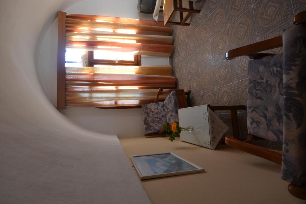 Postel nebo postele na pokoji v ubytování Villa Georgia