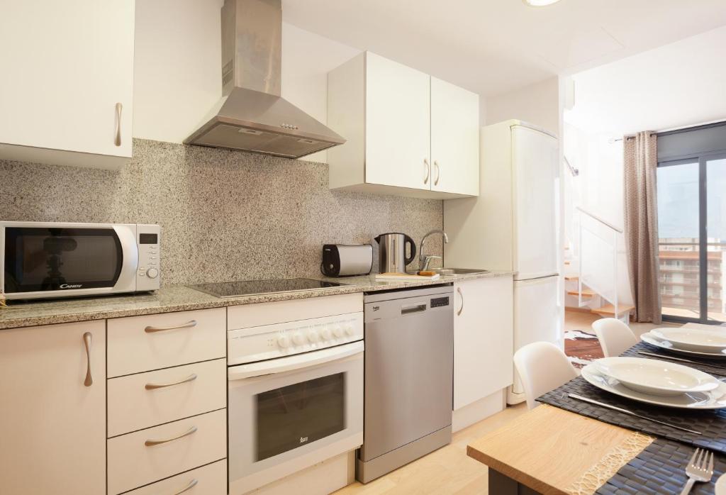 Kuchnia lub aneks kuchenny w obiekcie Apartment Beach Front Canet