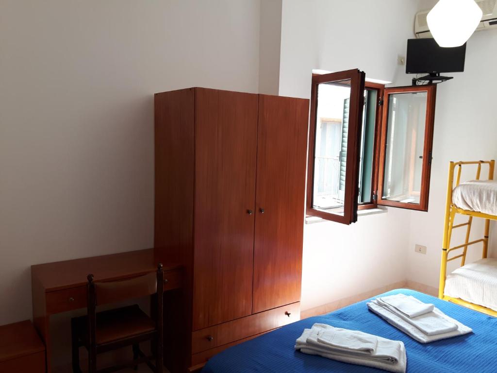 Postel nebo postele na pokoji v ubytování Parigino