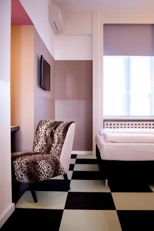 Postel nebo postele na pokoji v ubytování Hotel Cristall - Frankfurt City