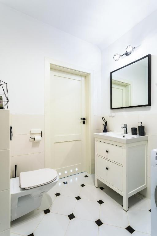 Kúpeľňa v ubytovaní Apartament 43 z widokiem na jezioro - Giżycko