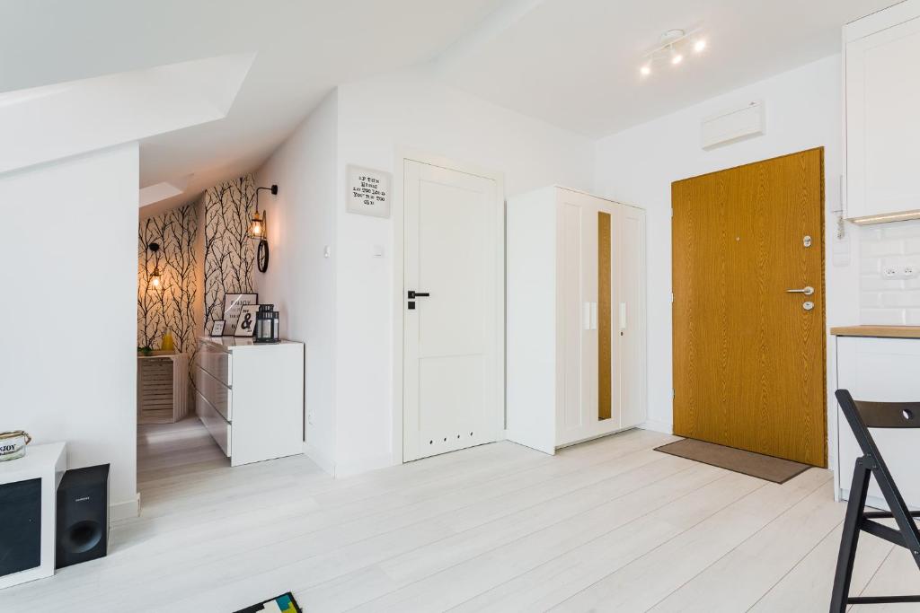 Kuchyňa alebo kuchynka v ubytovaní Apartament 43 z widokiem na jezioro - Giżycko