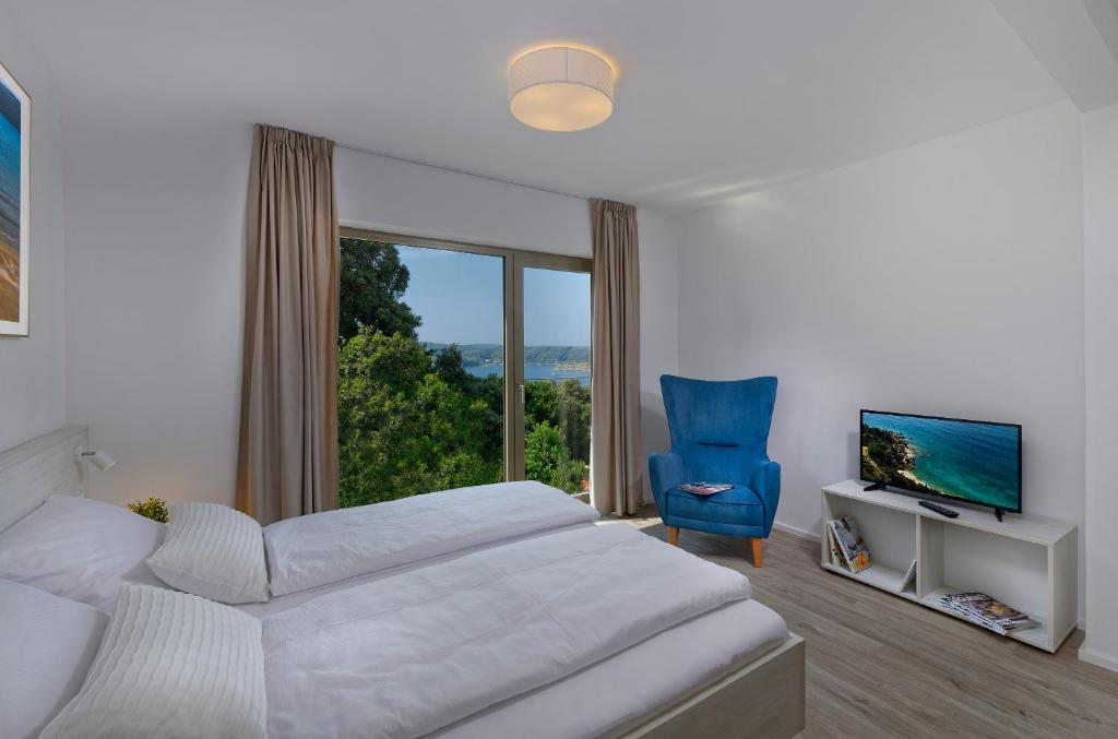 Zlatni Zalaz,Apartments,Supetarska Draga - Appartement Avec Vue Sur Le Jardin