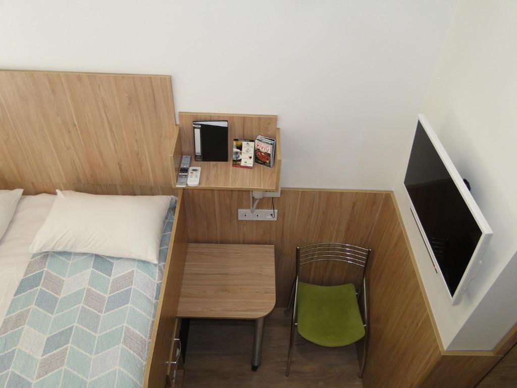 Postel nebo postele na pokoji v ubytování Mini ELEGANT