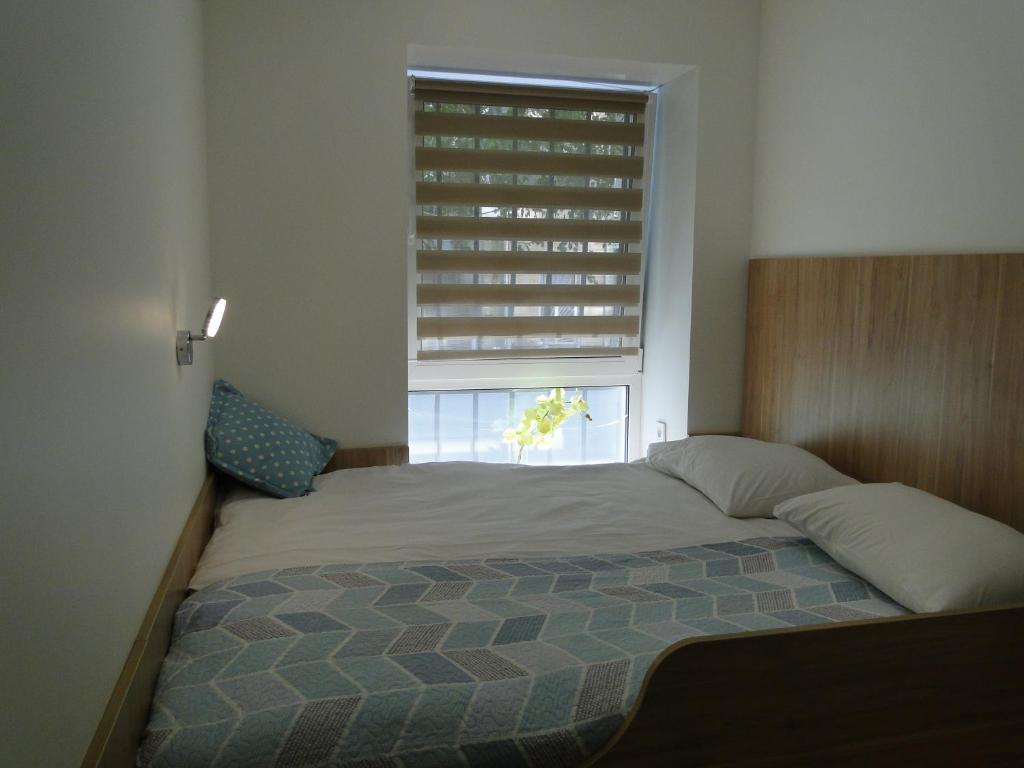 Postel nebo postele na pokoji v ubytování Mini ELEGANT