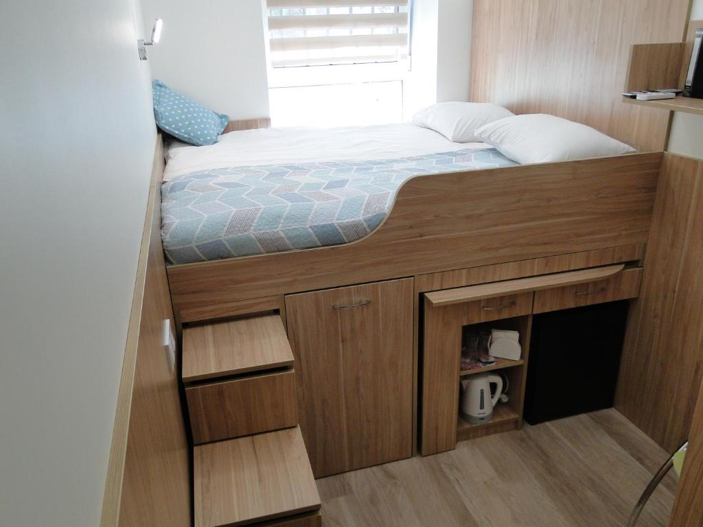 Postel nebo postele na pokoji v ubytování Mini ELEGANT