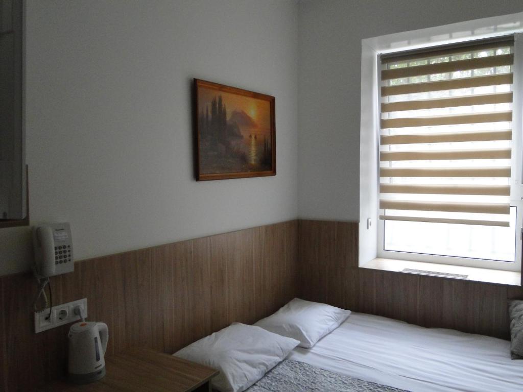 Postel nebo postele na pokoji v ubytování Mini ELEGANT