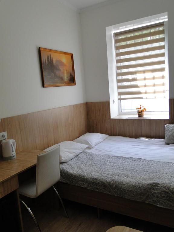 Postel nebo postele na pokoji v ubytování Mini ELEGANT