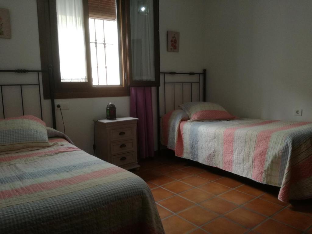 Postel nebo postele na pokoji v ubytování Casa Rural Aya I