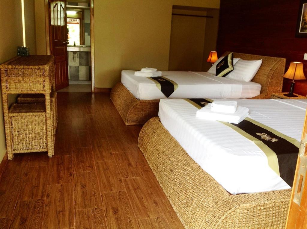 Postel nebo postele na pokoji v ubytování Atmaland Resort