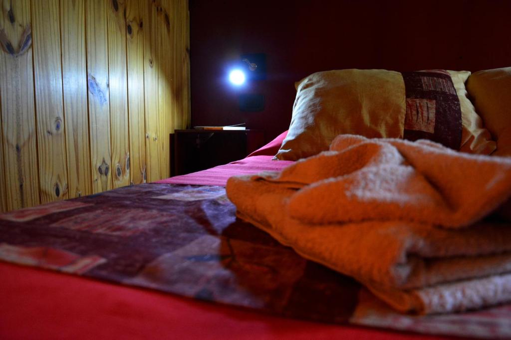 Postel nebo postele na pokoji v ubytování Carpe Diem Cabañas & Suites