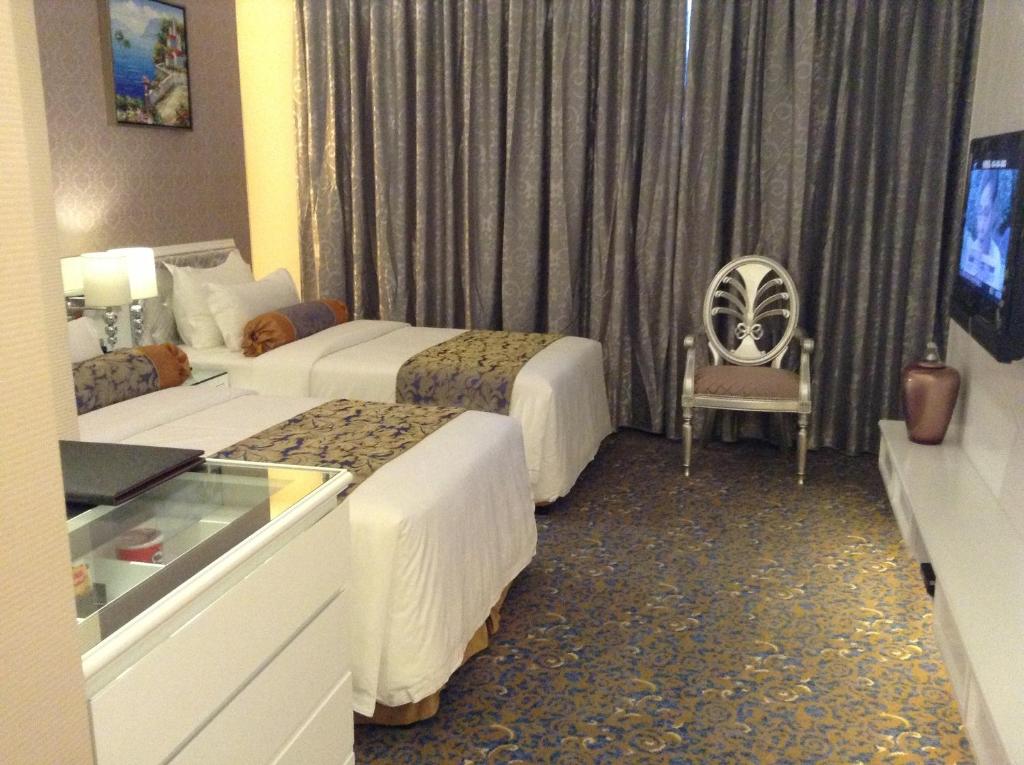 TV a/nebo společenská místnost v ubytování Hotel Metropole