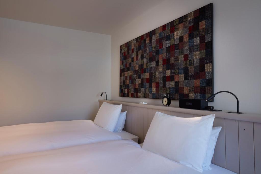 Кровать или кровати в номере Matsumoto Hotel Kagetsu