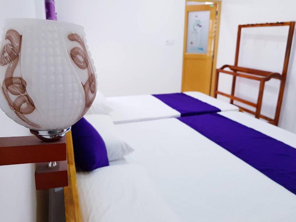 Postel nebo postele na pokoji v ubytování SNP Star Guest House