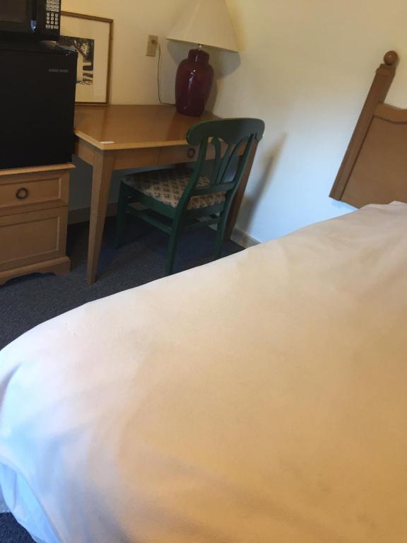 Postel nebo postele na pokoji v ubytování Mt Baker Hotel