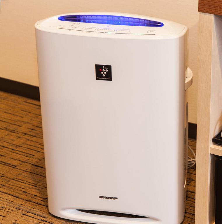 a white refrigerator sitting on top of a floor at Hotel Mystays Premier Akasaka in Tokyo