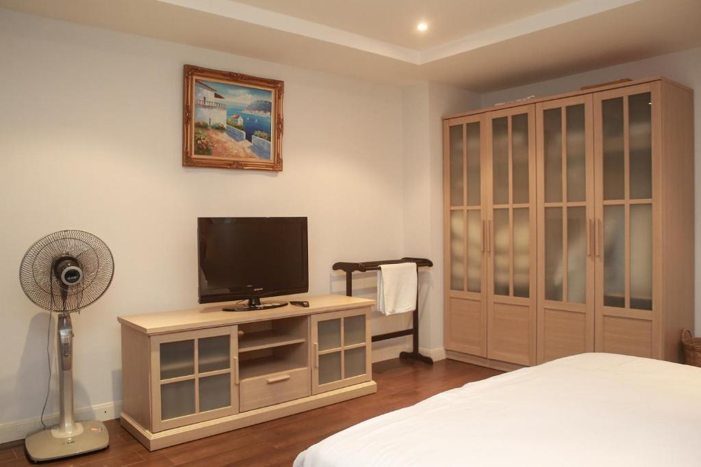 TV a/nebo společenská místnost v ubytování Jomtien Beach Penthouses Condo