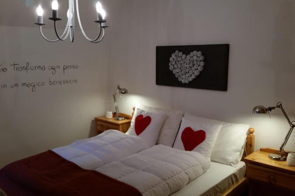 Postel nebo postele na pokoji v ubytování il bosco in casa