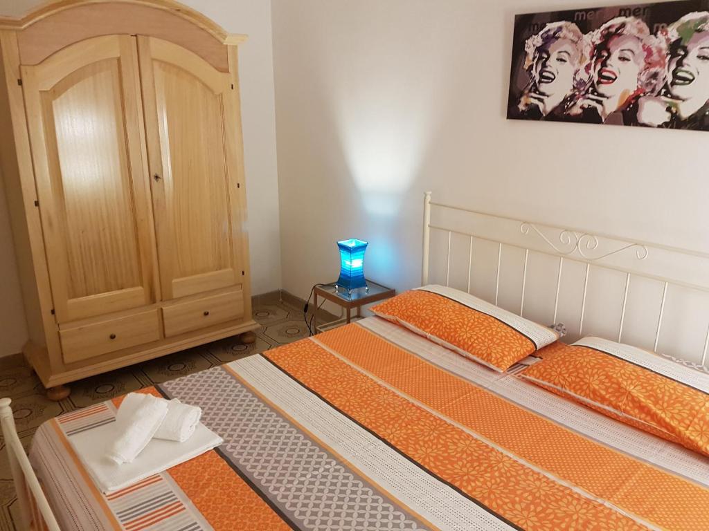 Postel nebo postele na pokoji v ubytování Residence Orsa Minore