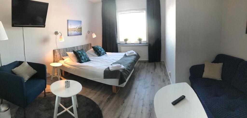 Postel nebo postele na pokoji v ubytování Långbergets Sporthotell