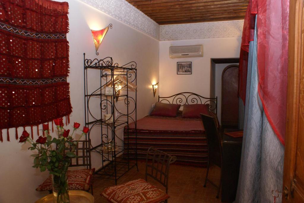 Postel nebo postele na pokoji v ubytování Riad Attarine