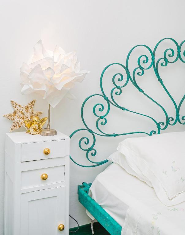 Posteľ alebo postele v izbe v ubytovaní Apartment and Rooms Lapad