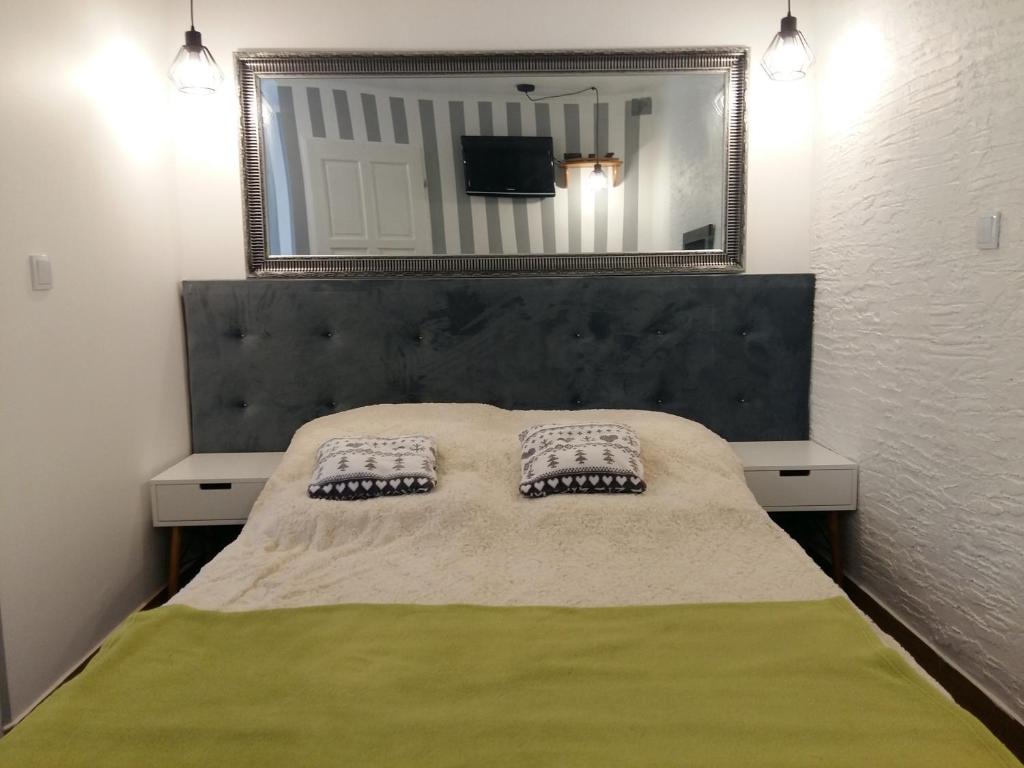 Posteľ alebo postele v izbe v ubytovaní Domek 87