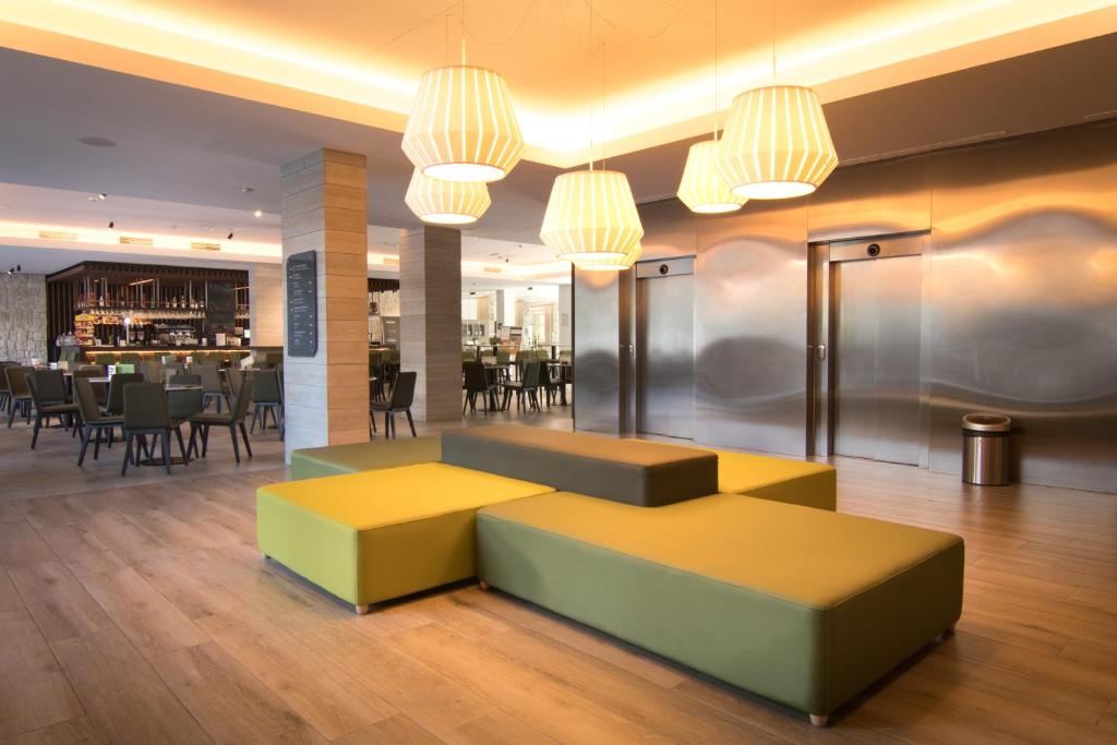 Zona de estar de Hotel Cap Negret