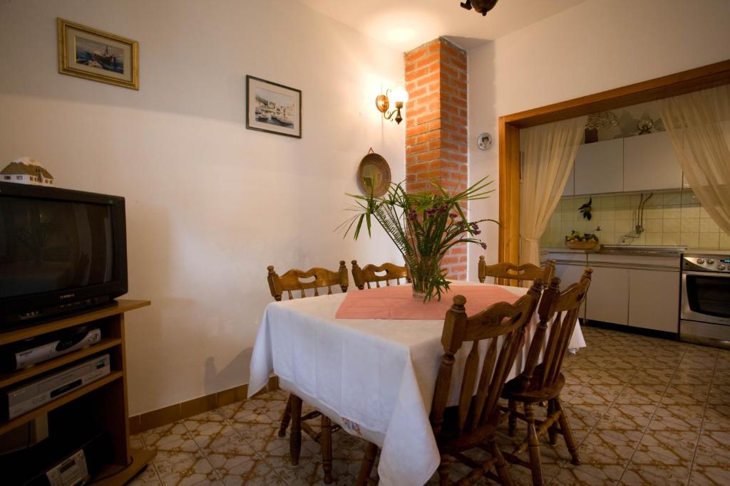 Kuchyň nebo kuchyňský kout v ubytování Apartments Topo