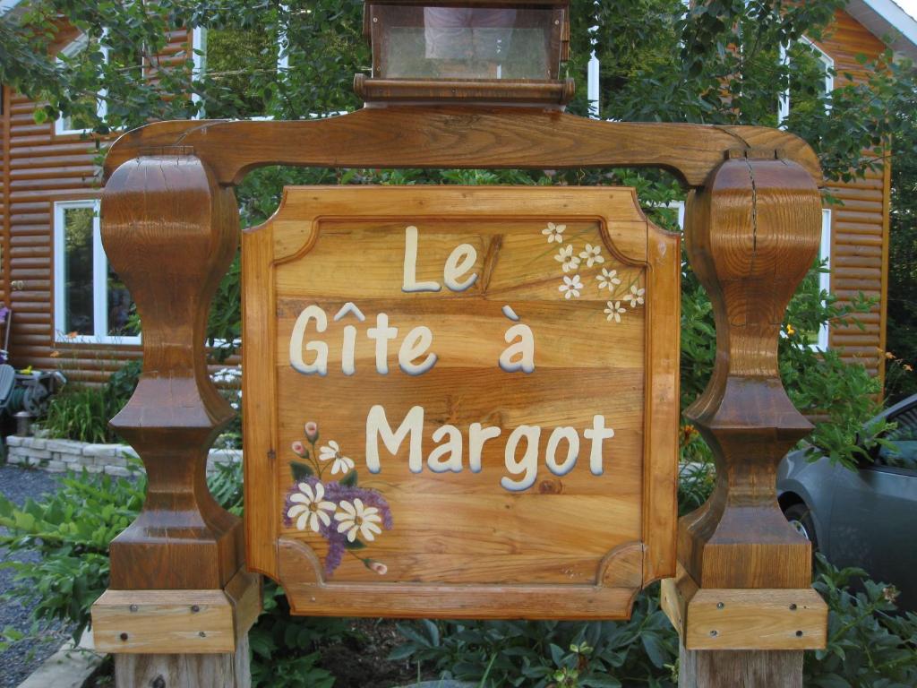 una señal que dice la cite a maropt en Le Gite A Margot, en Bromont