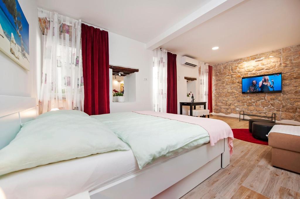 Postel nebo postele na pokoji v ubytování La Svalba Rooms & Studios