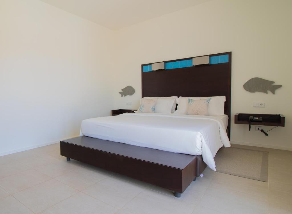 Cama o camas de una habitación en Hotel Dunas de Sal