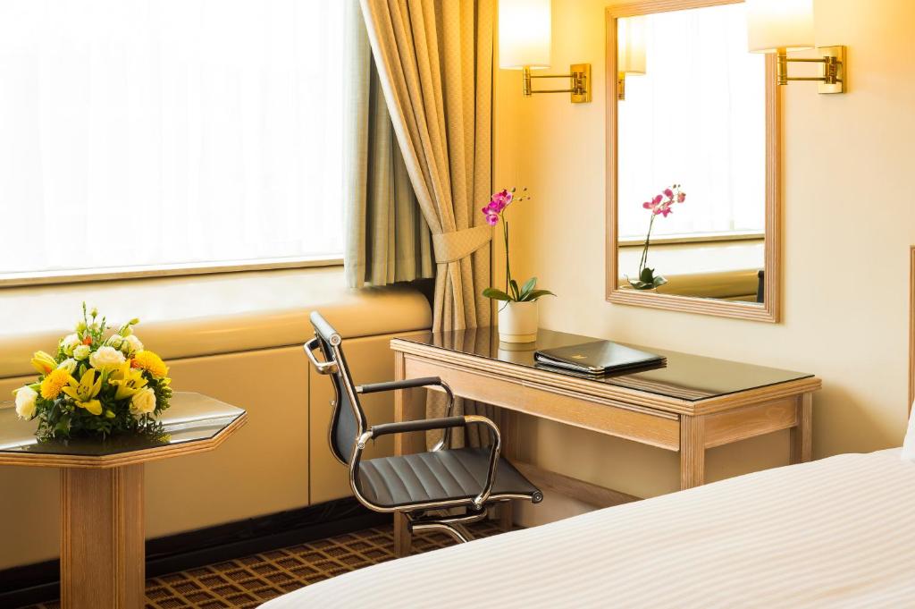 Postel nebo postele na pokoji v ubytování Copthorne Tara Hotel London Kensington