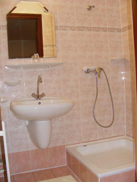Koupelna v ubytování Hotel Fama