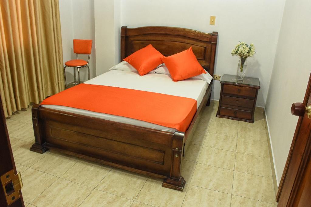 Postel nebo postele na pokoji v ubytování Hotel el Lago 2
