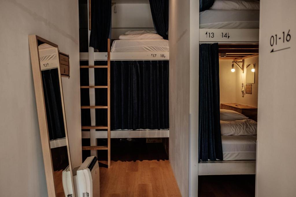 Postel nebo postele na pokoji v ubytování Blue Hour Kanazawa
