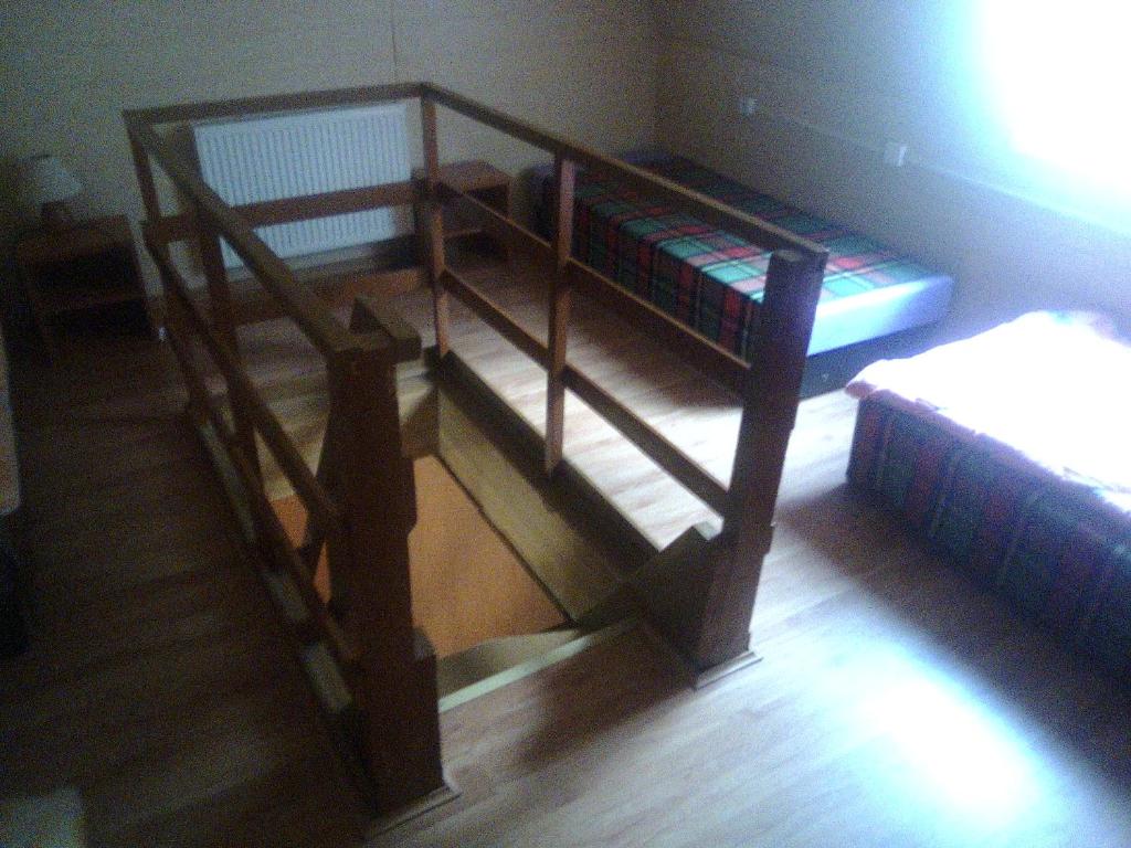 Postel nebo postele na pokoji v ubytování Ośrodek Wczasowy "GRONOSTAJ"