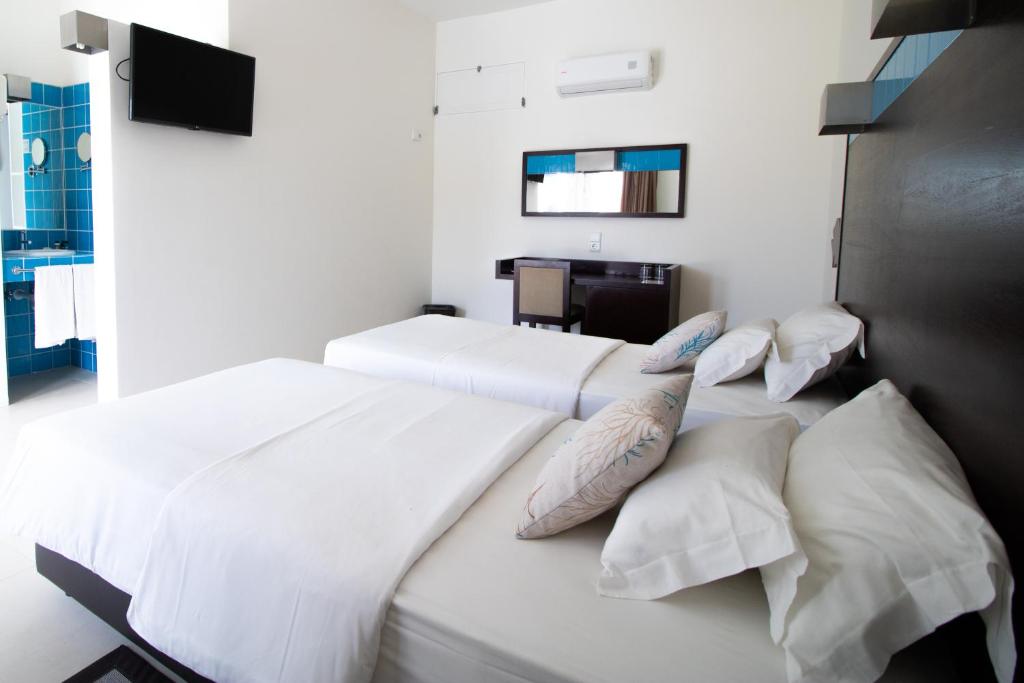 Cama o camas de una habitación en Hotel Dunas de Sal