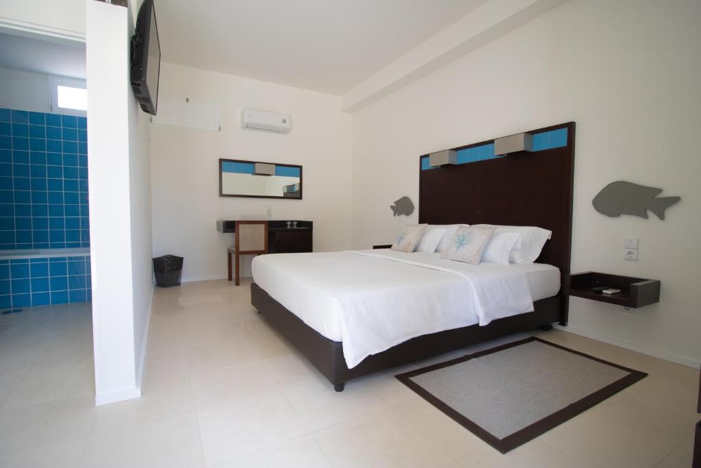 Cama o camas de una habitación en Hotel Dunas de Sal