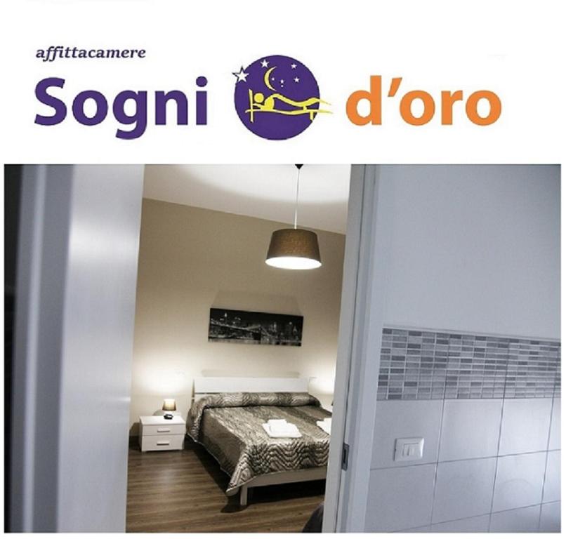 a poster of a bedroom with a bed in a room at Affittacamere Sogni D'oro in Lamezia Terme