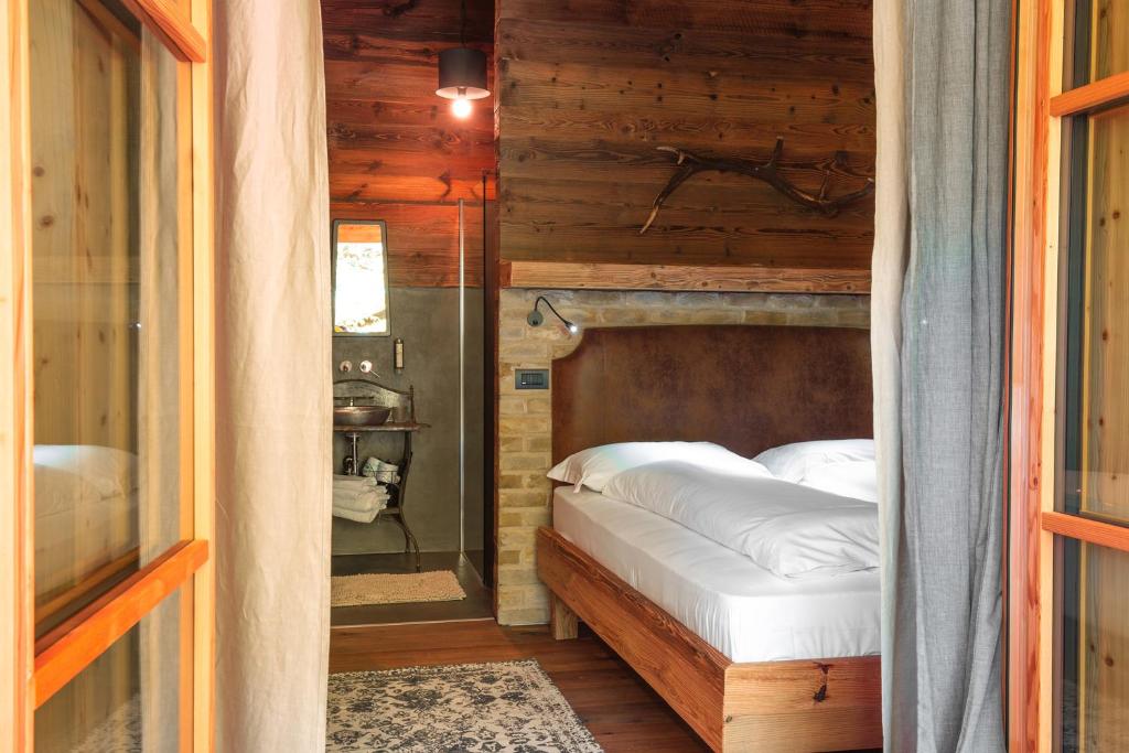Postel nebo postele na pokoji v ubytování LMC Guesthouse