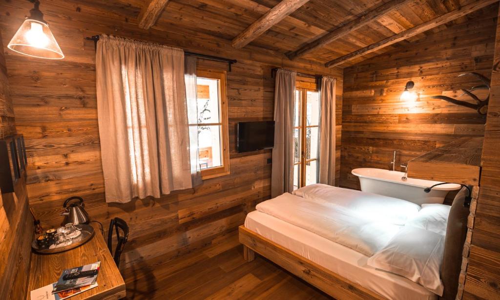 Postel nebo postele na pokoji v ubytování LMC Guesthouse