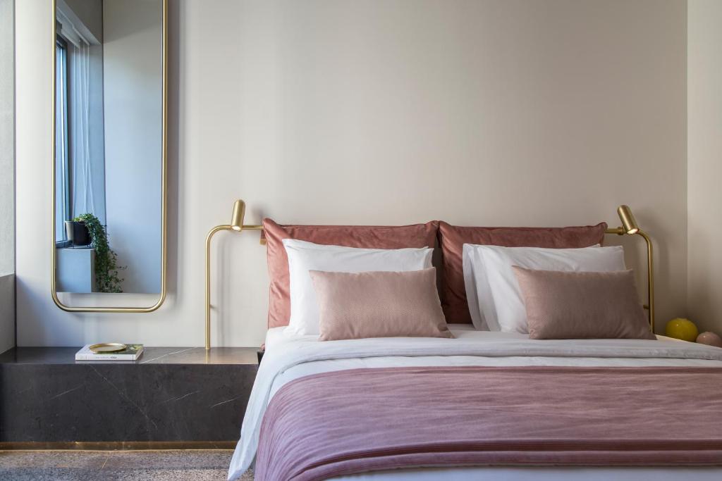 Postel nebo postele na pokoji v ubytování Perianth Hotel, a Member of Design Hotels