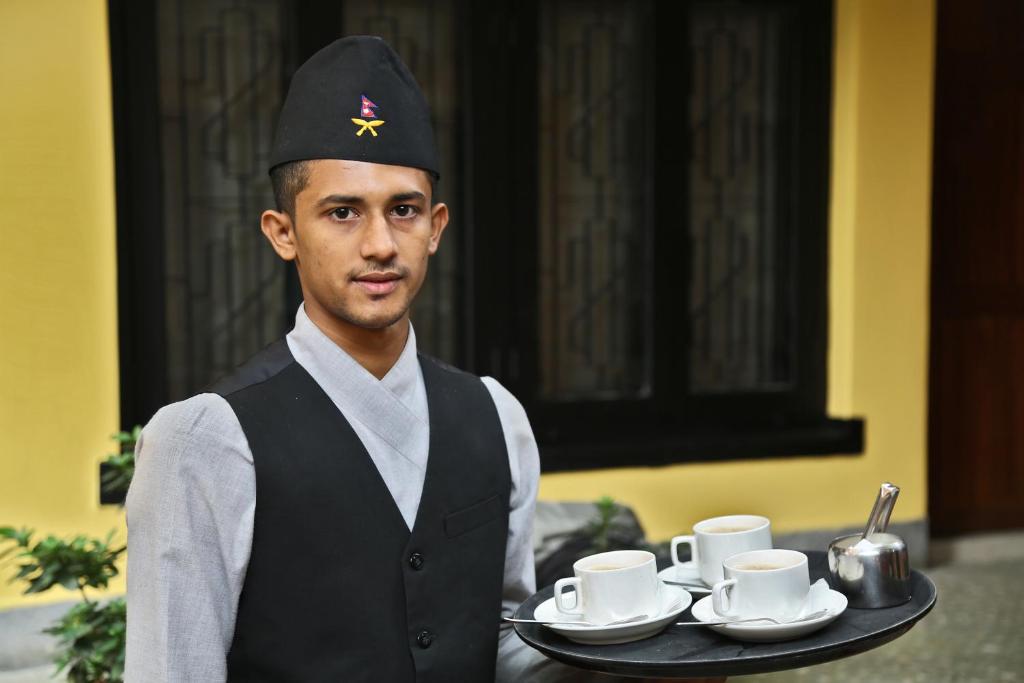 Členové personálu v ubytování Taleju Boutique Hotel