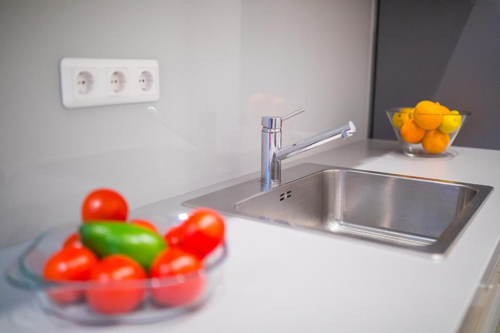 Kuchyňa alebo kuchynka v ubytovaní Deluxe Apartment Talia