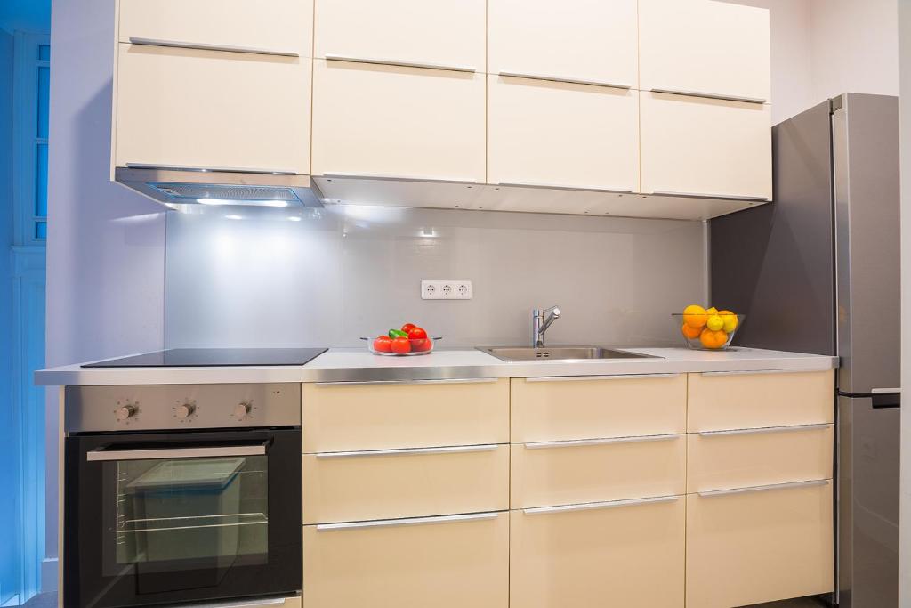 Kuchyňa alebo kuchynka v ubytovaní Deluxe Apartment Talia
