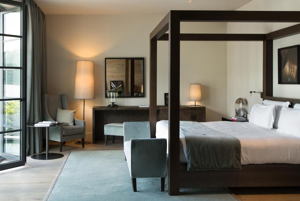 Postel nebo postele na pokoji v ubytování Filario Hotel & Residences