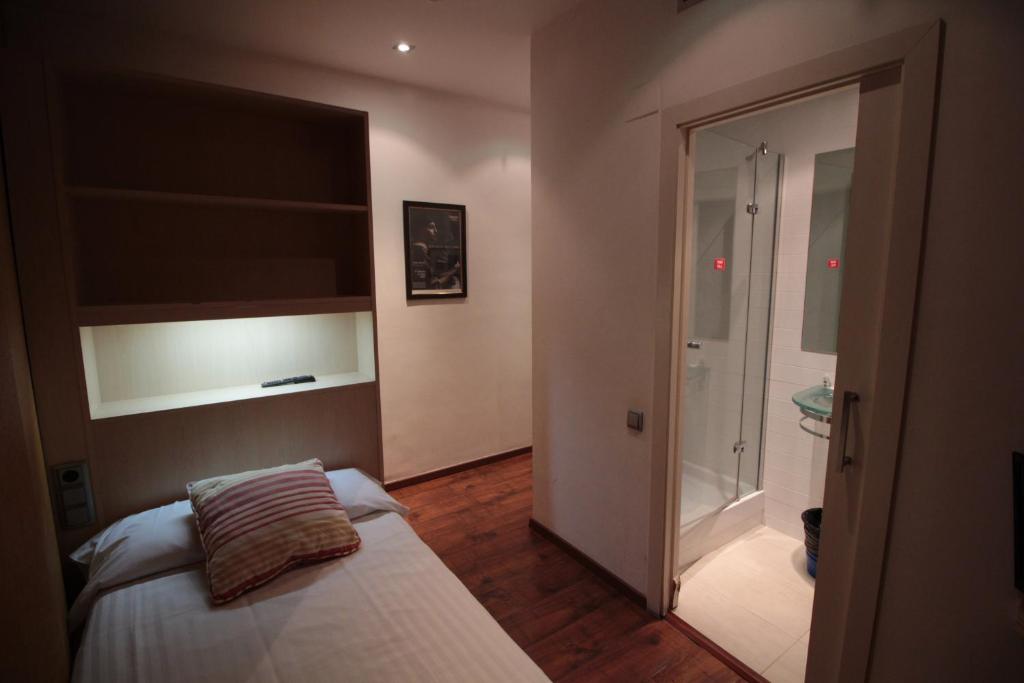 Postel nebo postele na pokoji v ubytování Hotel Annex - Rey Don Jaime I